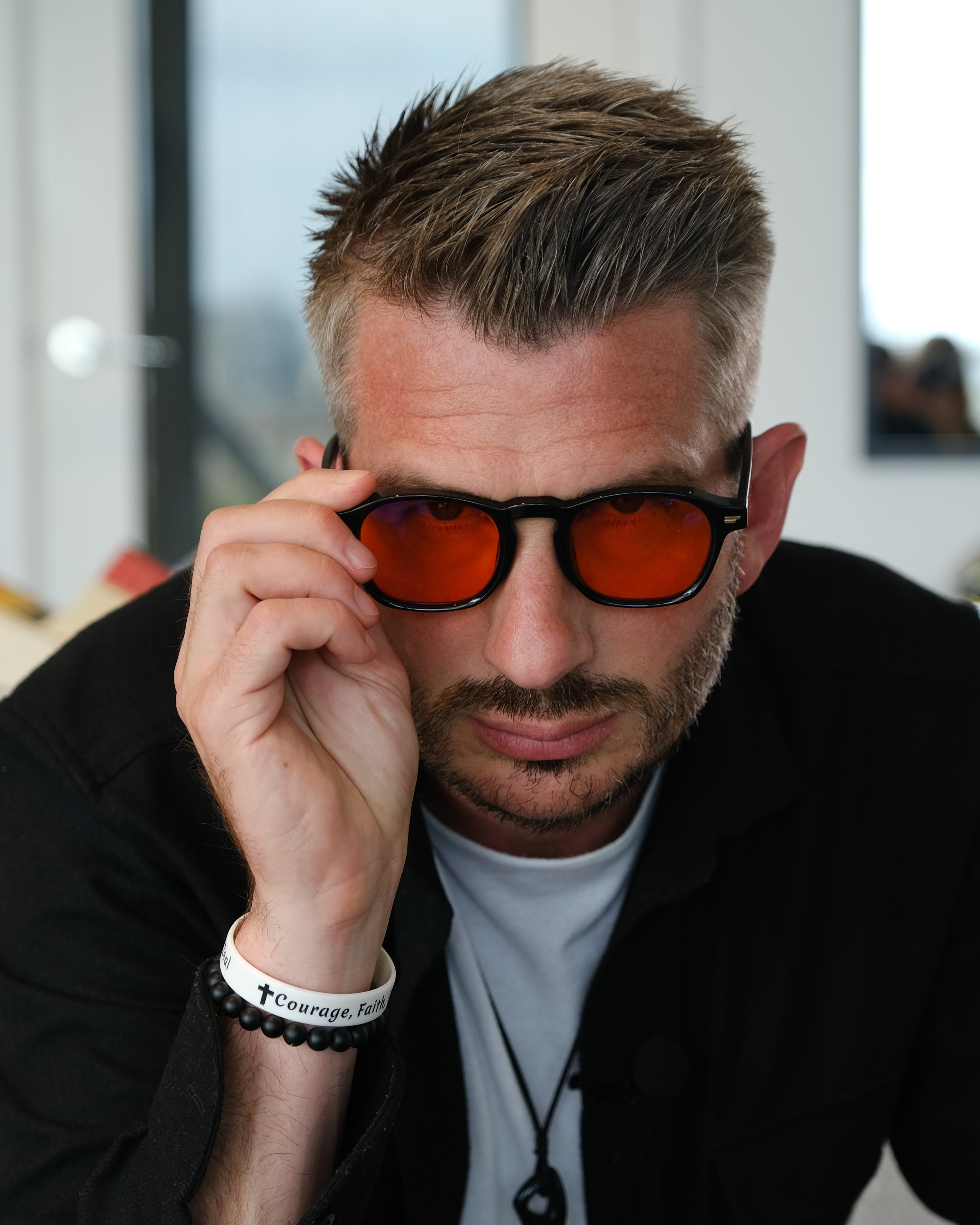 Tim Gray wearing Kensington Sleep Swannies blue light glasses