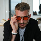 Tim Gray wearing Kensington Sleep Swannies blue light glasses