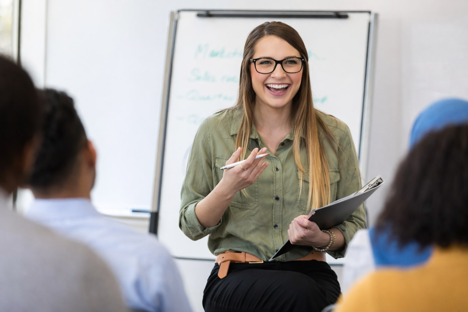 woman in classic focus swannies teaching